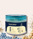 Creamy vegan peanut butter with blueberries, hemp seeds rich in antioxidants and Omegas; supports skin, coat, immunity; ideal for enrichment.