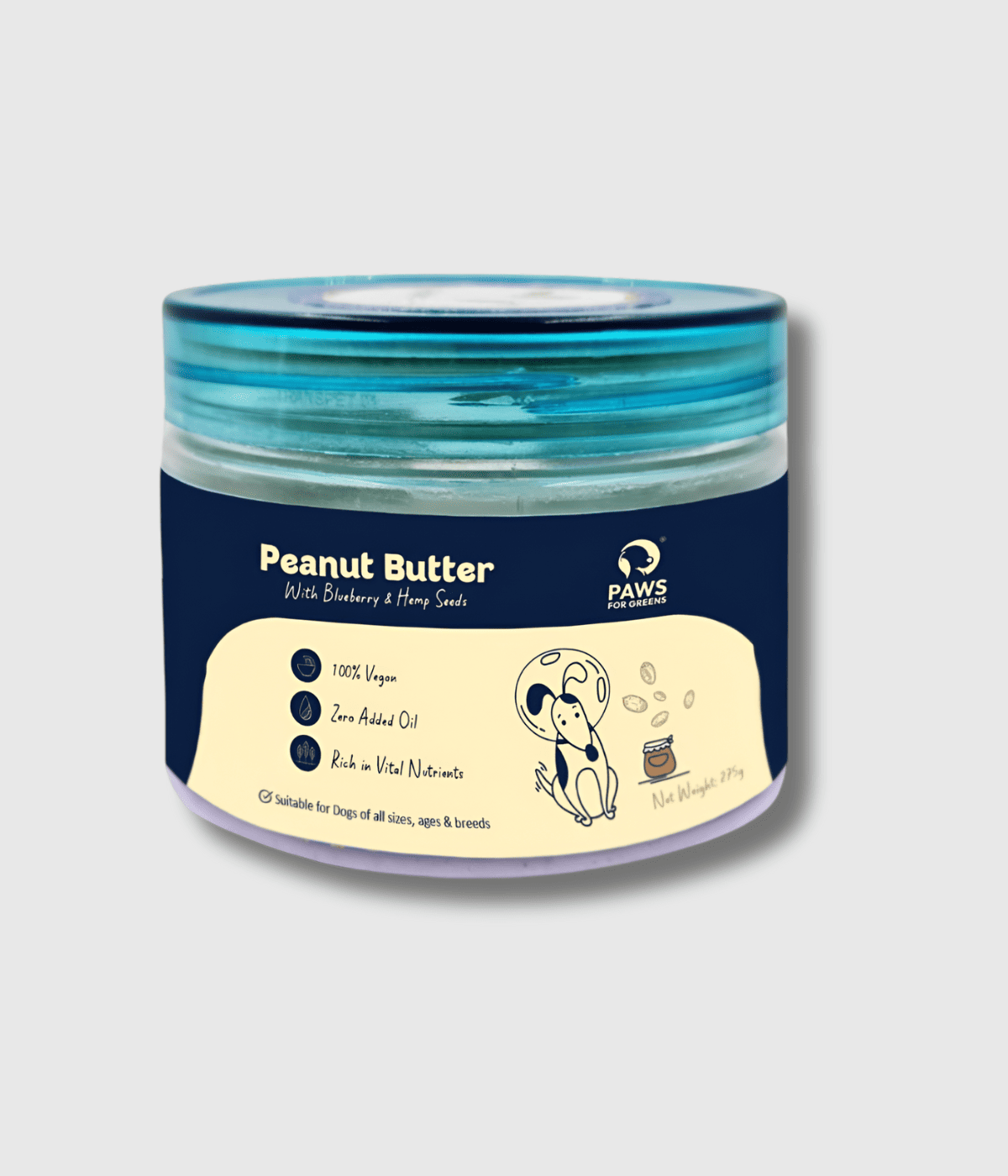 Jar of peanut butter for dogs with blue lid on a light gray background