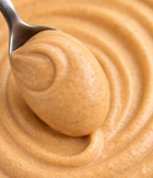 Creamy 100% peanut butter rich in natural protein and healthy fats; supports energy and vitality; ideal for enrichment and treats